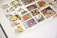 A collection of various collectible stamps displayed neatly in an album, featuring illustrations of flowers, plants, and scenes. The stamps are from different countries with a variety of colors and designs.