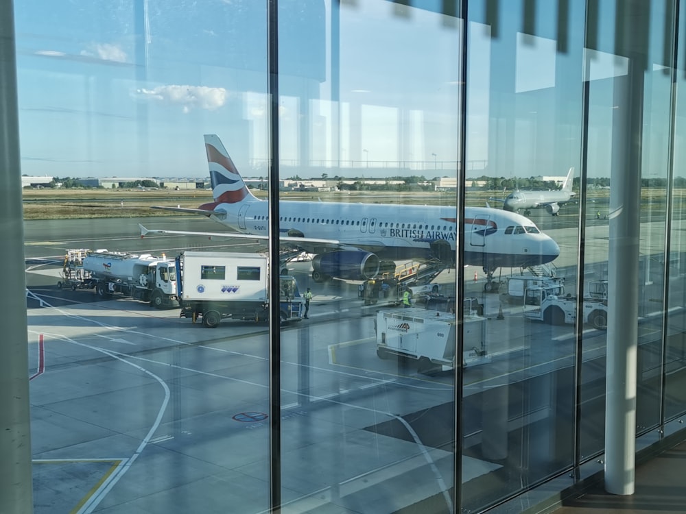 an airplane is parked at an airport