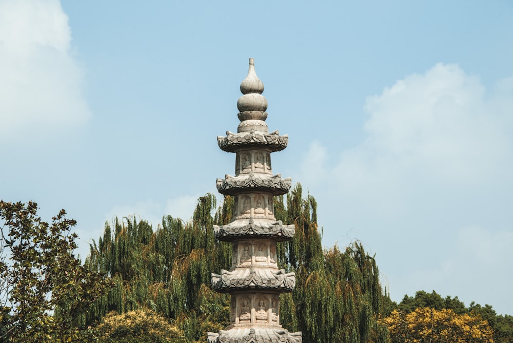 a tall tower surrounded by trees