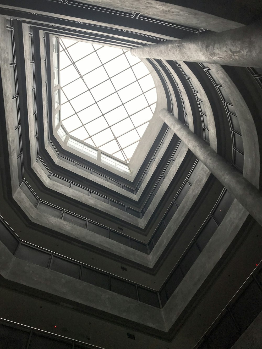 a window with a spiral staircase