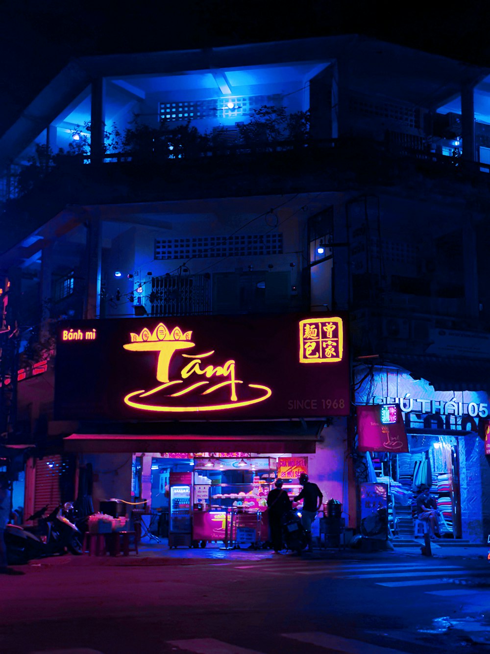 a building with neon signs