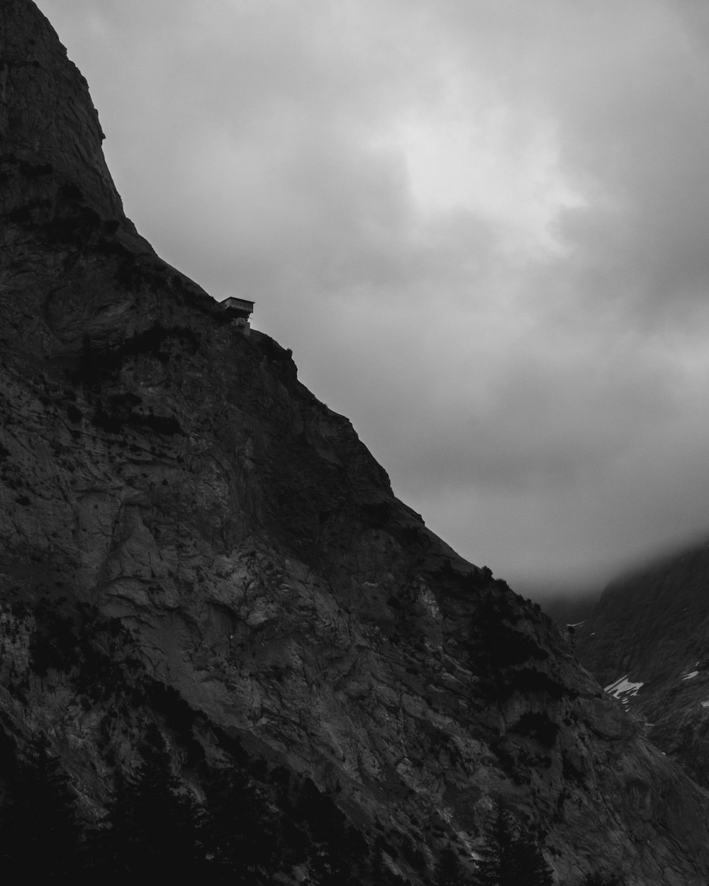 a person standing on a cliff