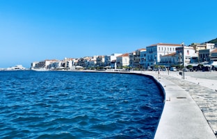 a body of water with buildings along it