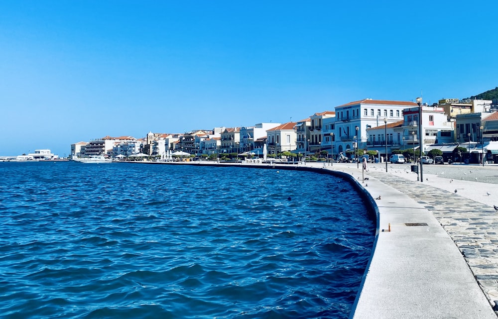 a body of water with buildings along it