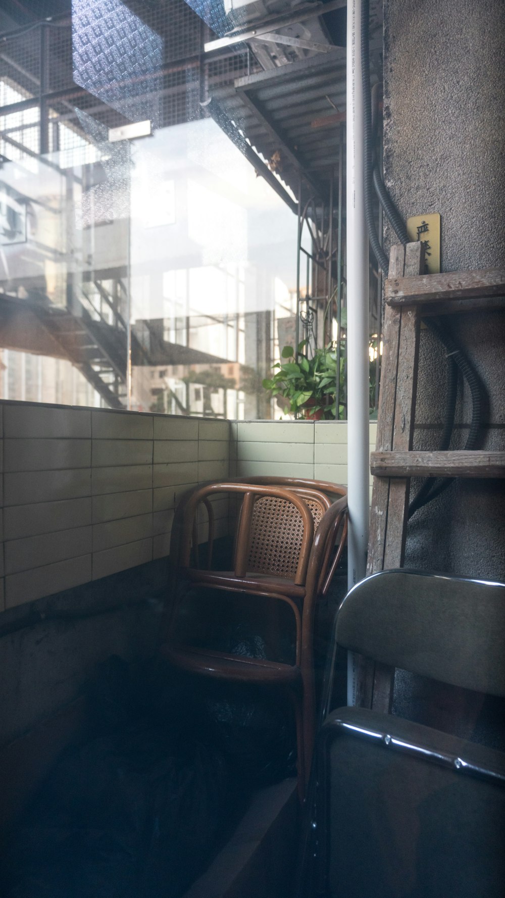 a chair and a table in a room with a window