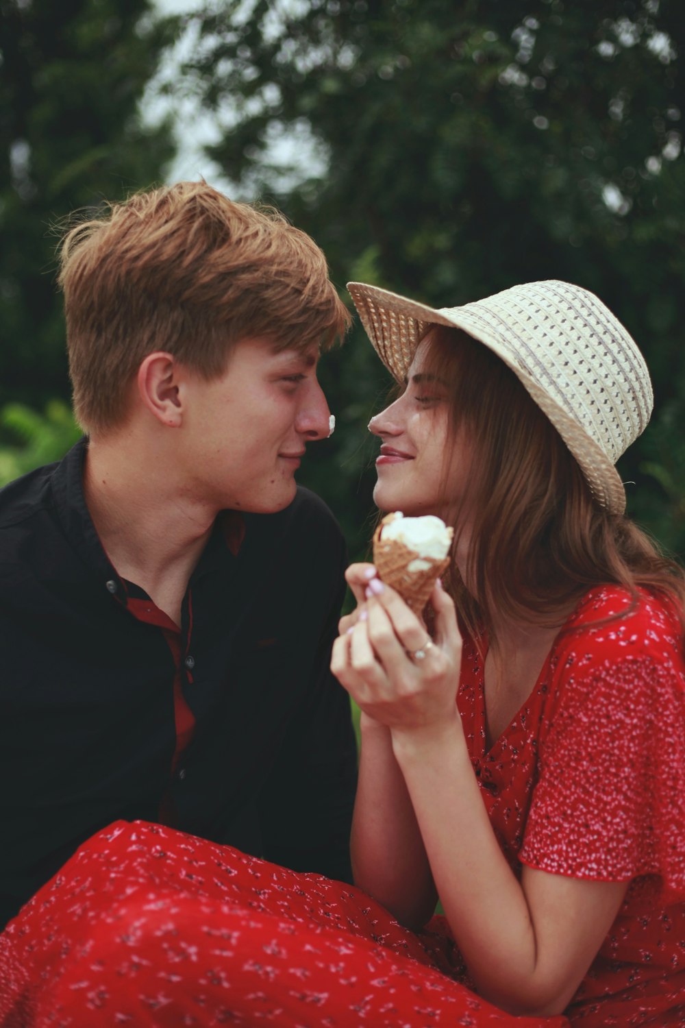 a man and woman eating ice cream