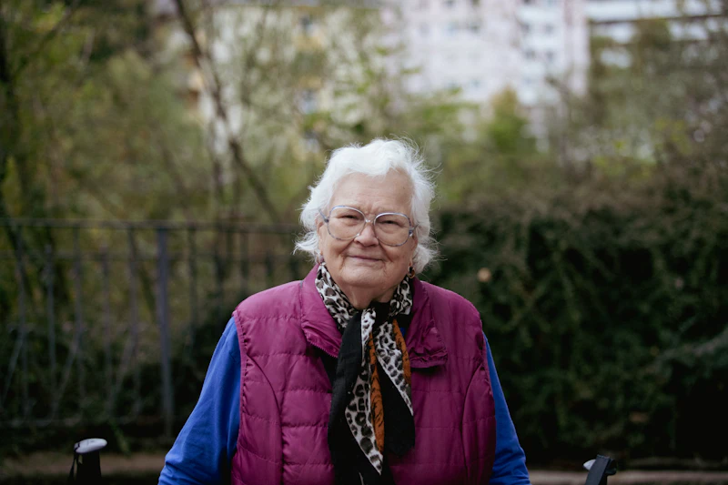 Calm older adult outdoors — wellbeing and rest