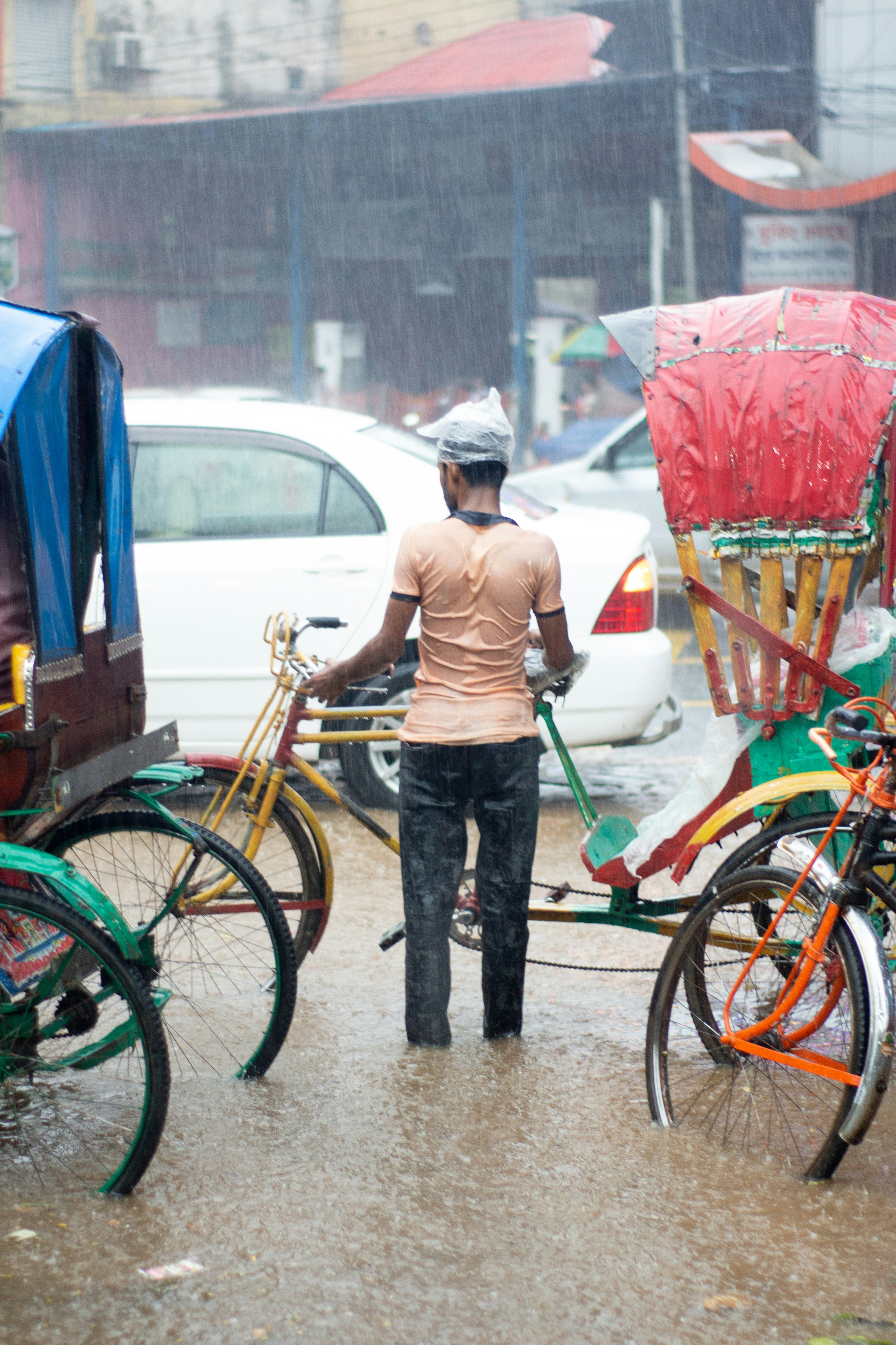 a person standing next to a bicycle