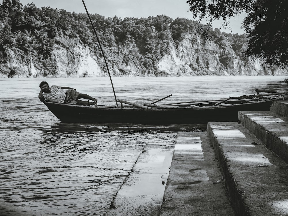 a person in a boat on a river