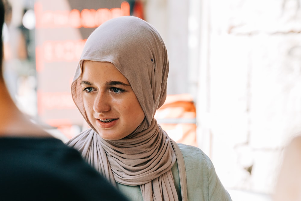 a person wearing a scarf