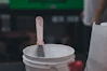 a wooden spoon in a cup