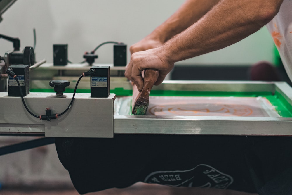 a person working on a machine