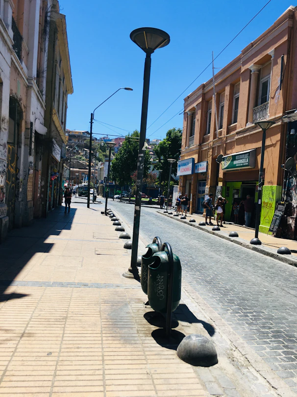 a street with a motorcycle parked on the side