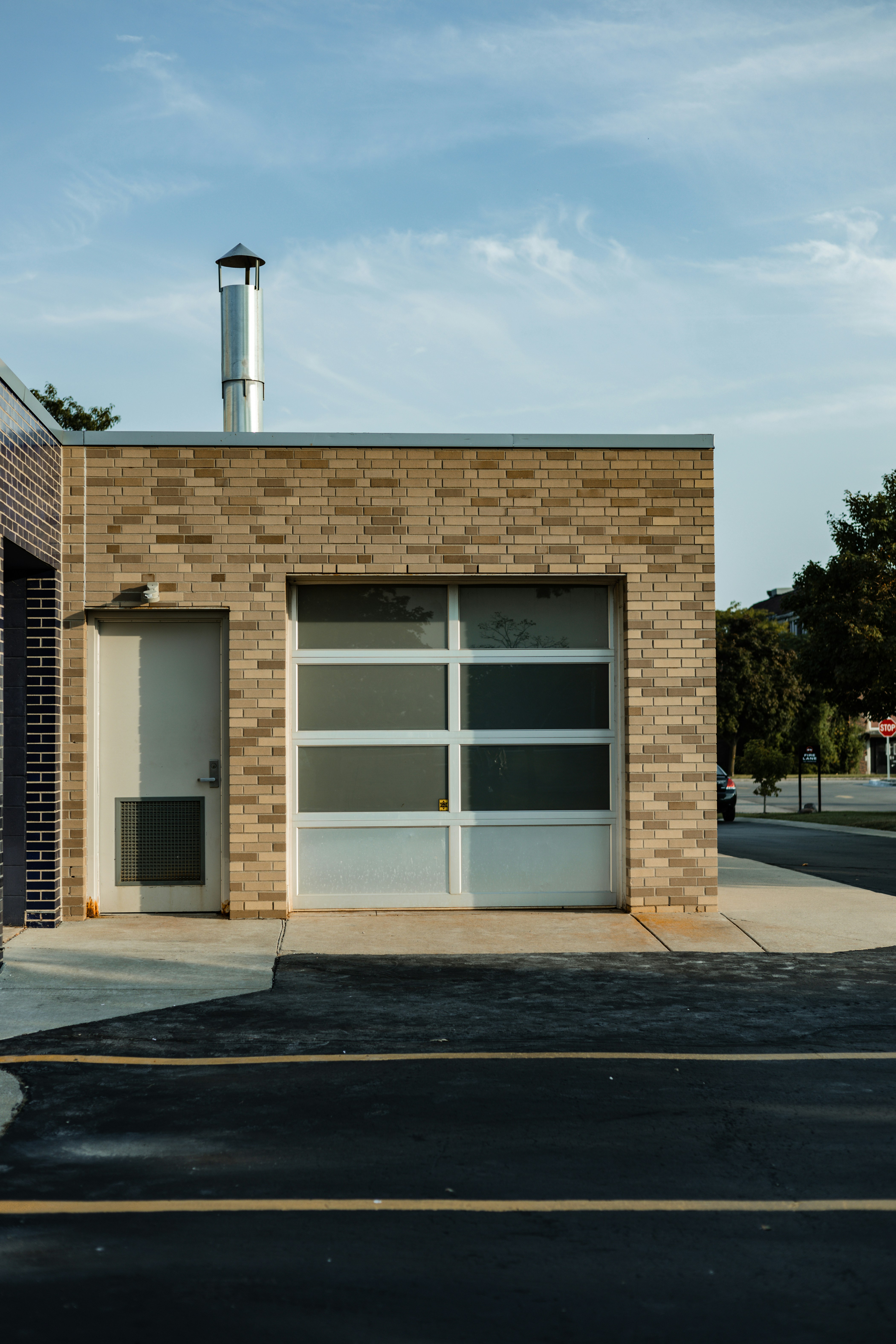 a building with a tower in the background