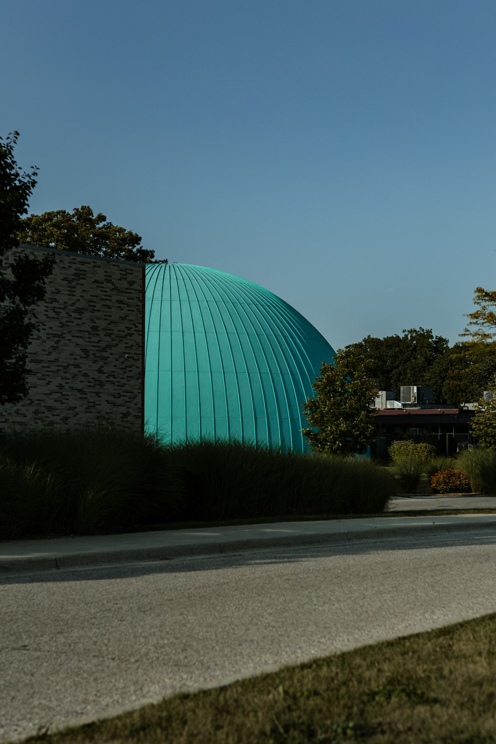 a large green dome shaped building