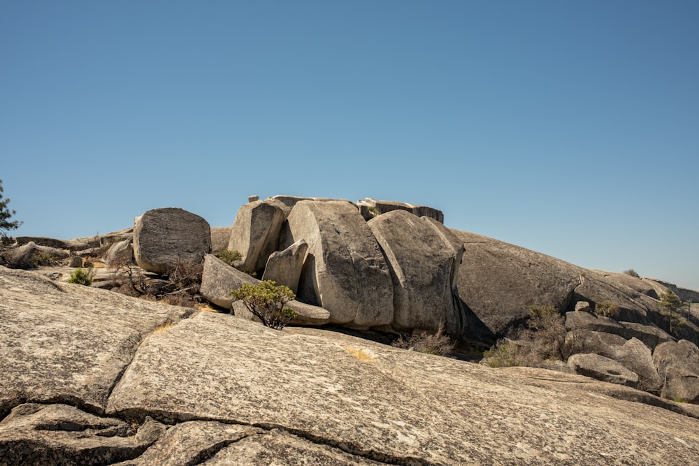 a rocky area with a blue sky