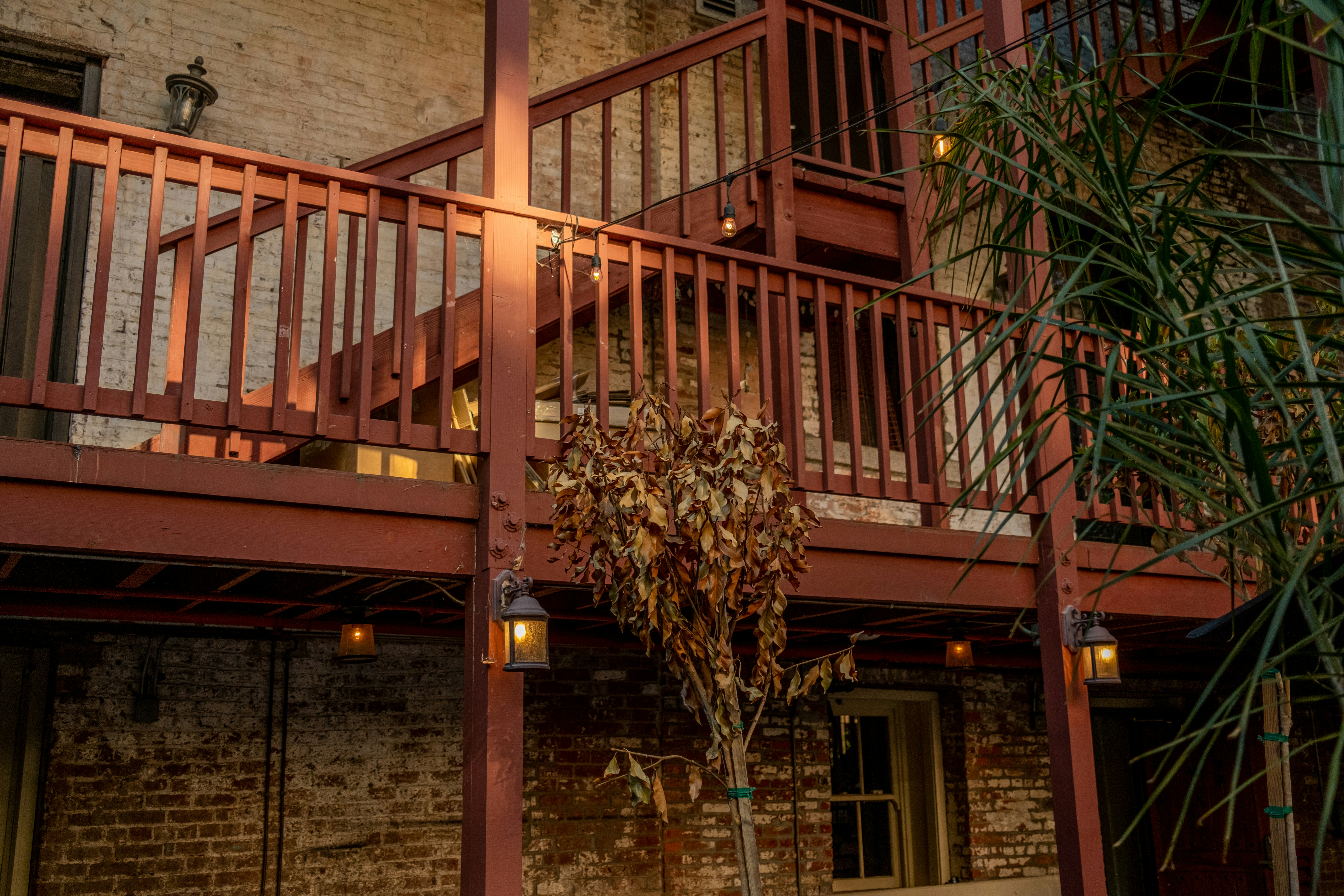 a building with a red railing
