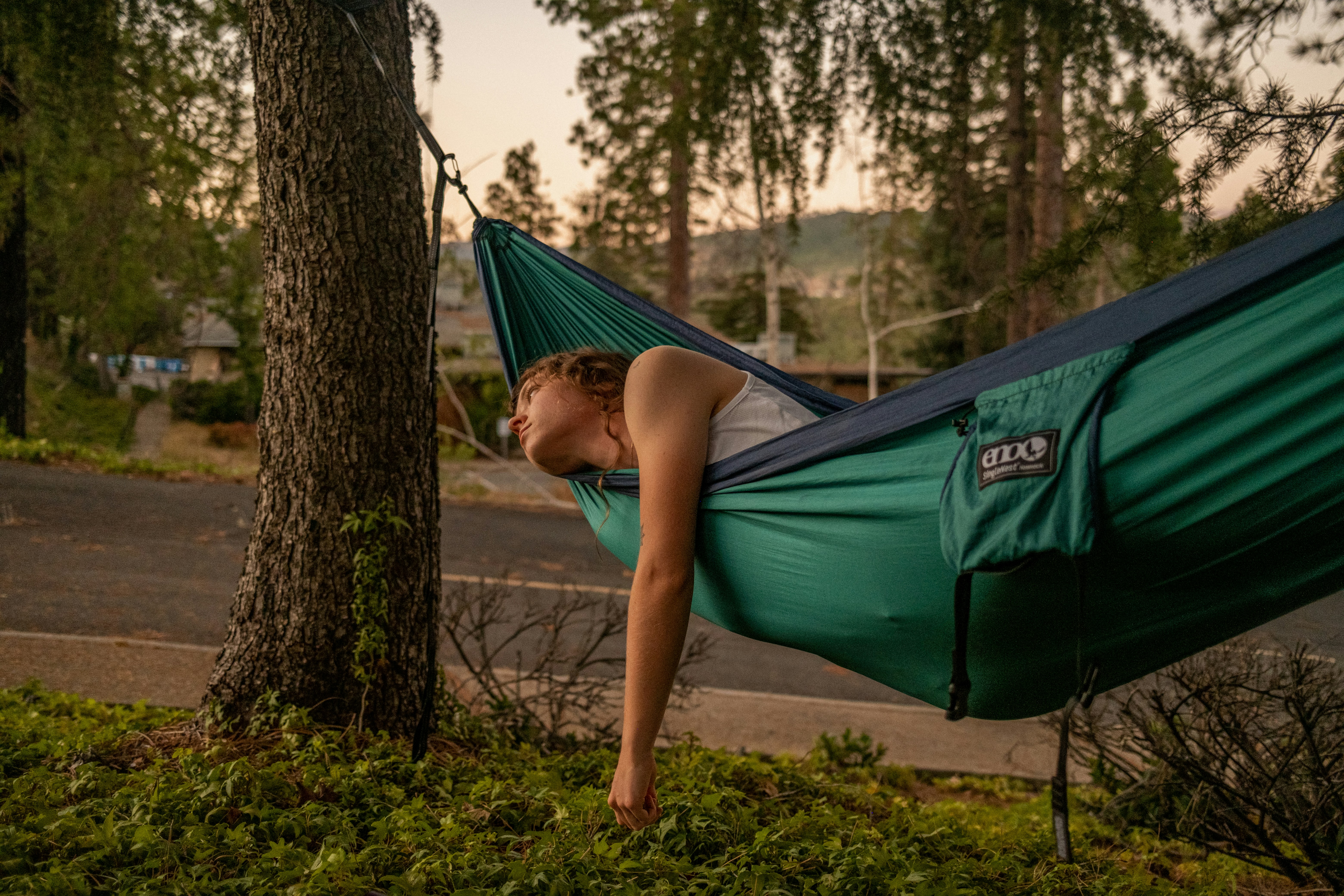 a boy lying in a tent, 