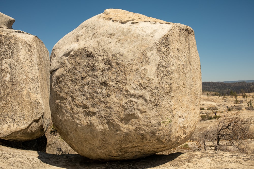 a large rock in a desert