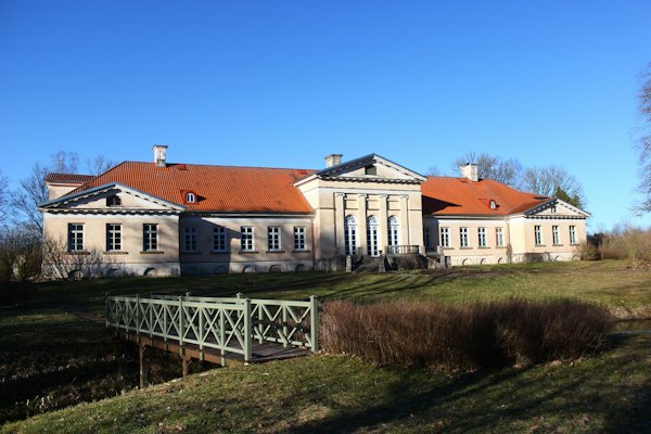 A large house with a fence in front of it — Jūrmala, Latvia
