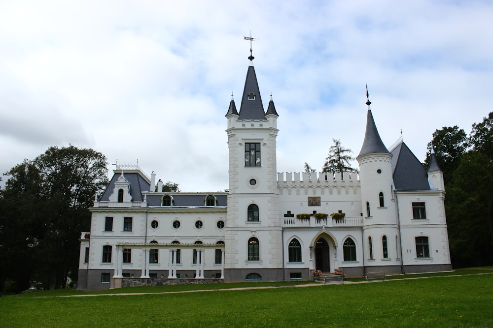 a white building with a cross on top