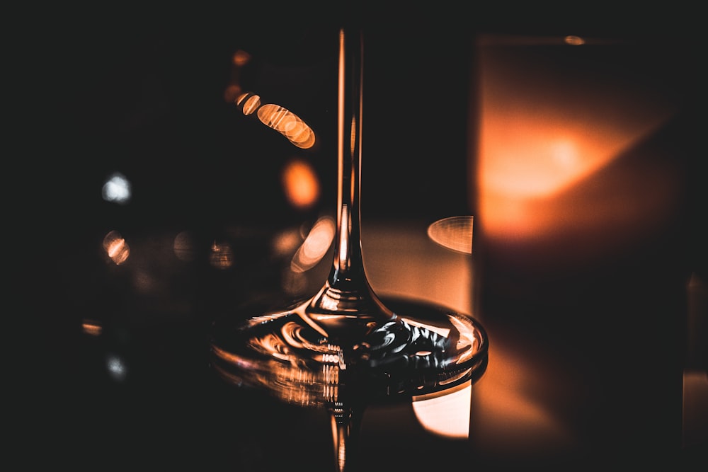 a glass of water being poured into a glass