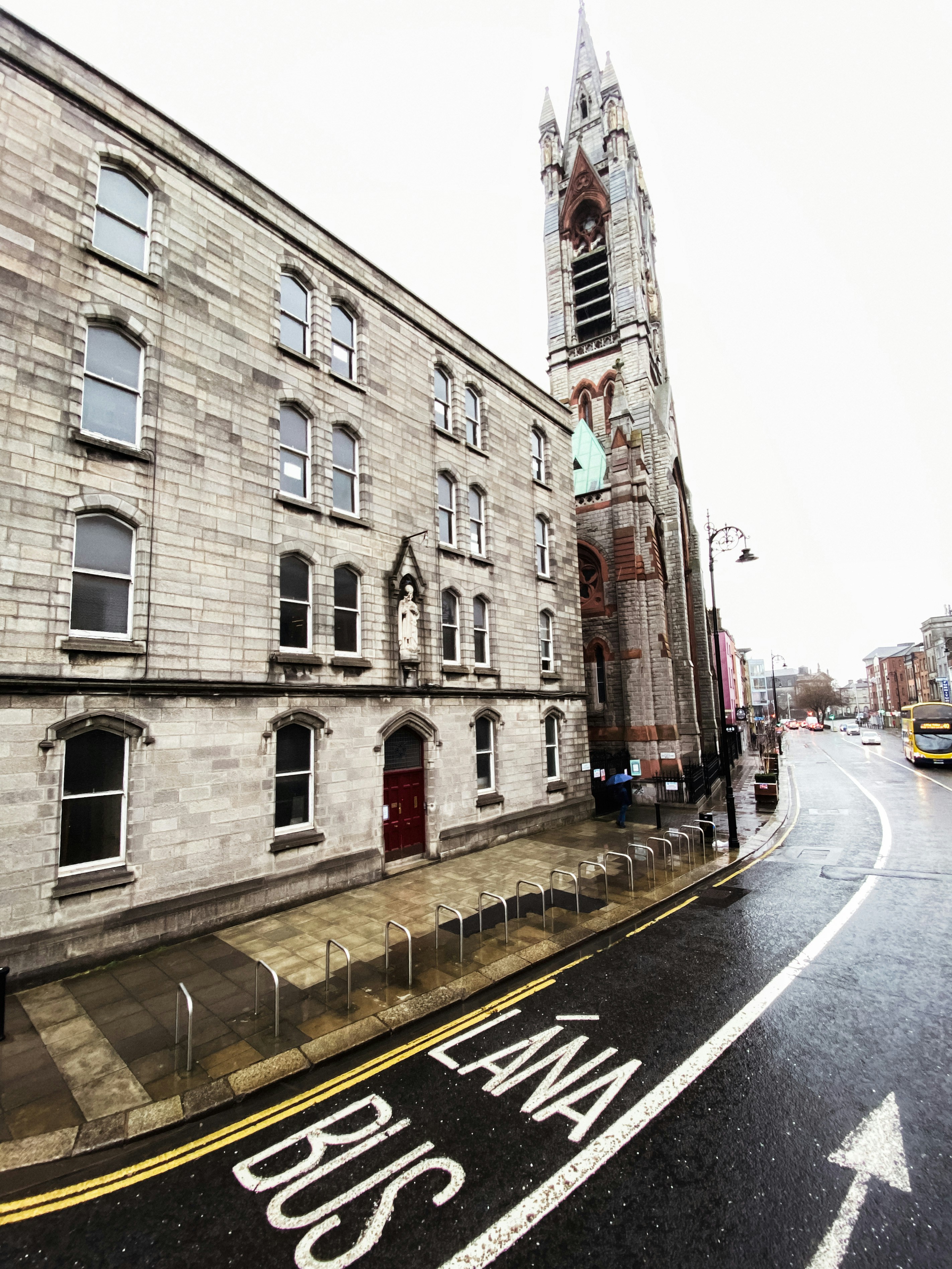 a street with a building on the side