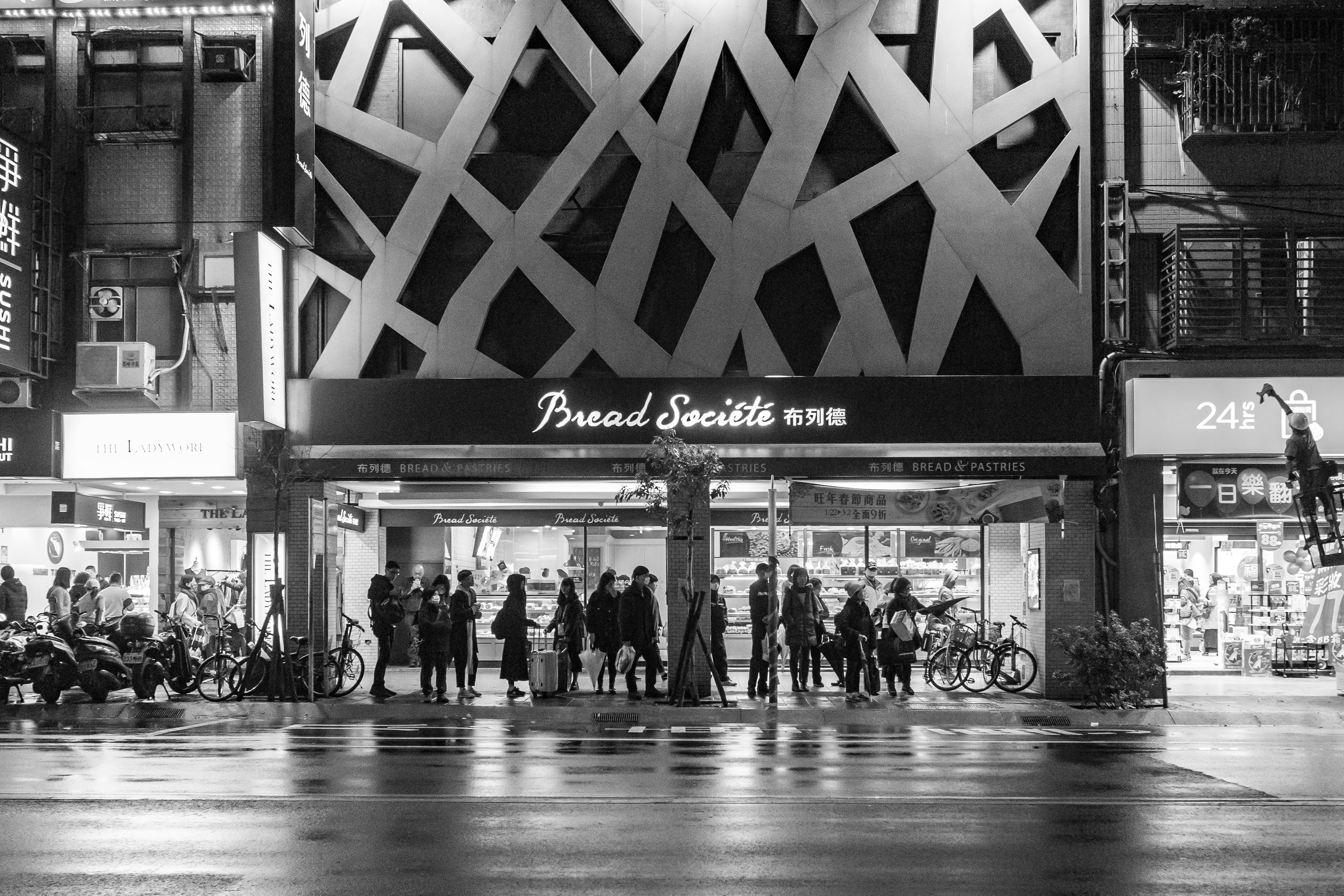 a group of people standing outside a building