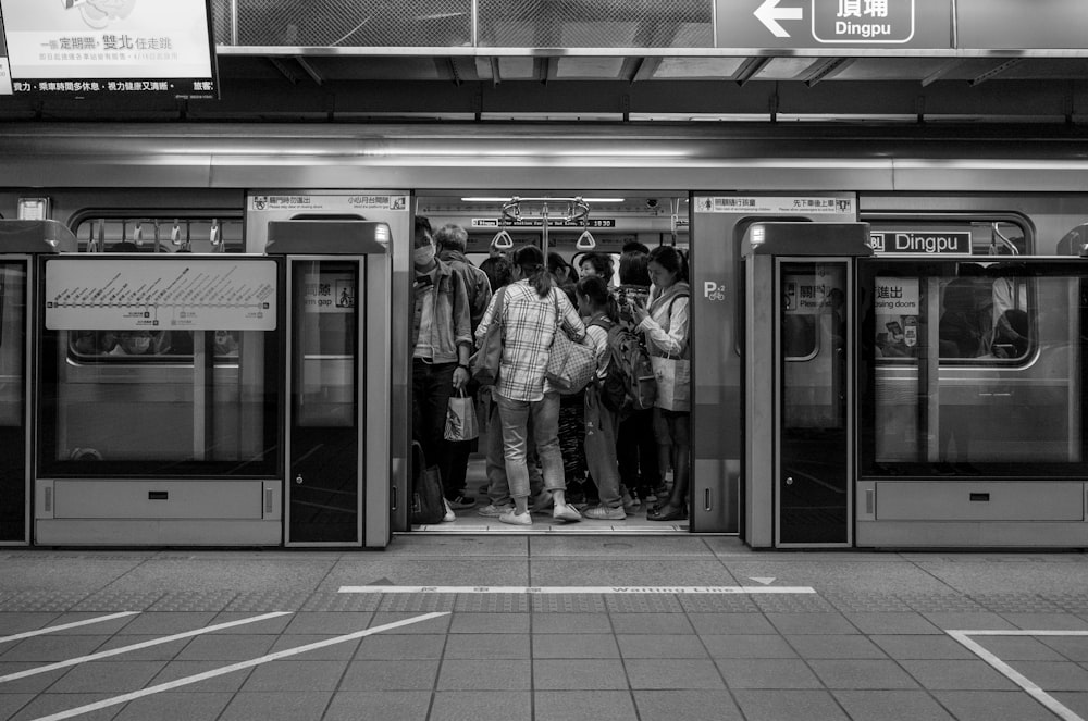 people waiting in a subway