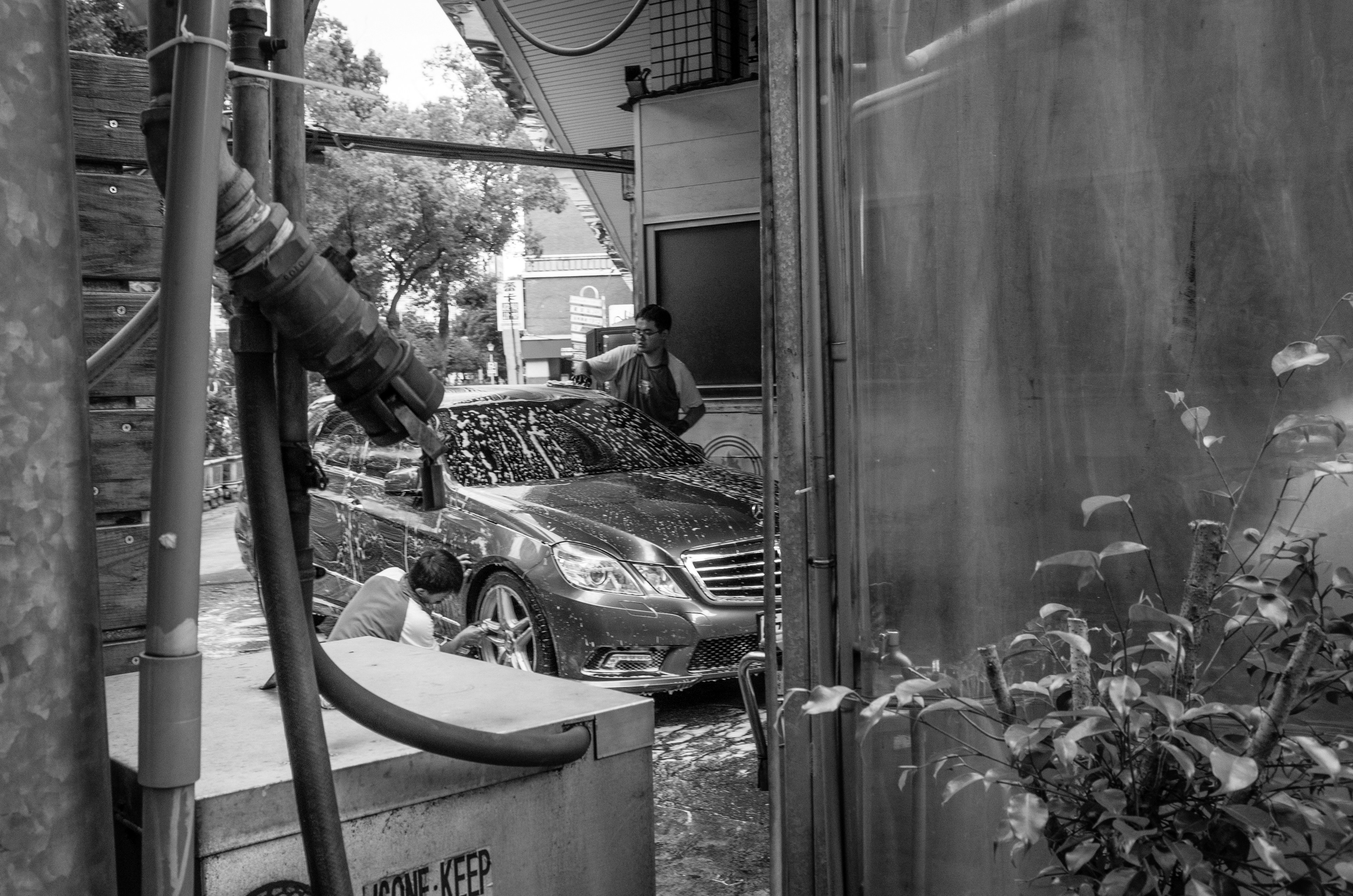 a person standing next to a car