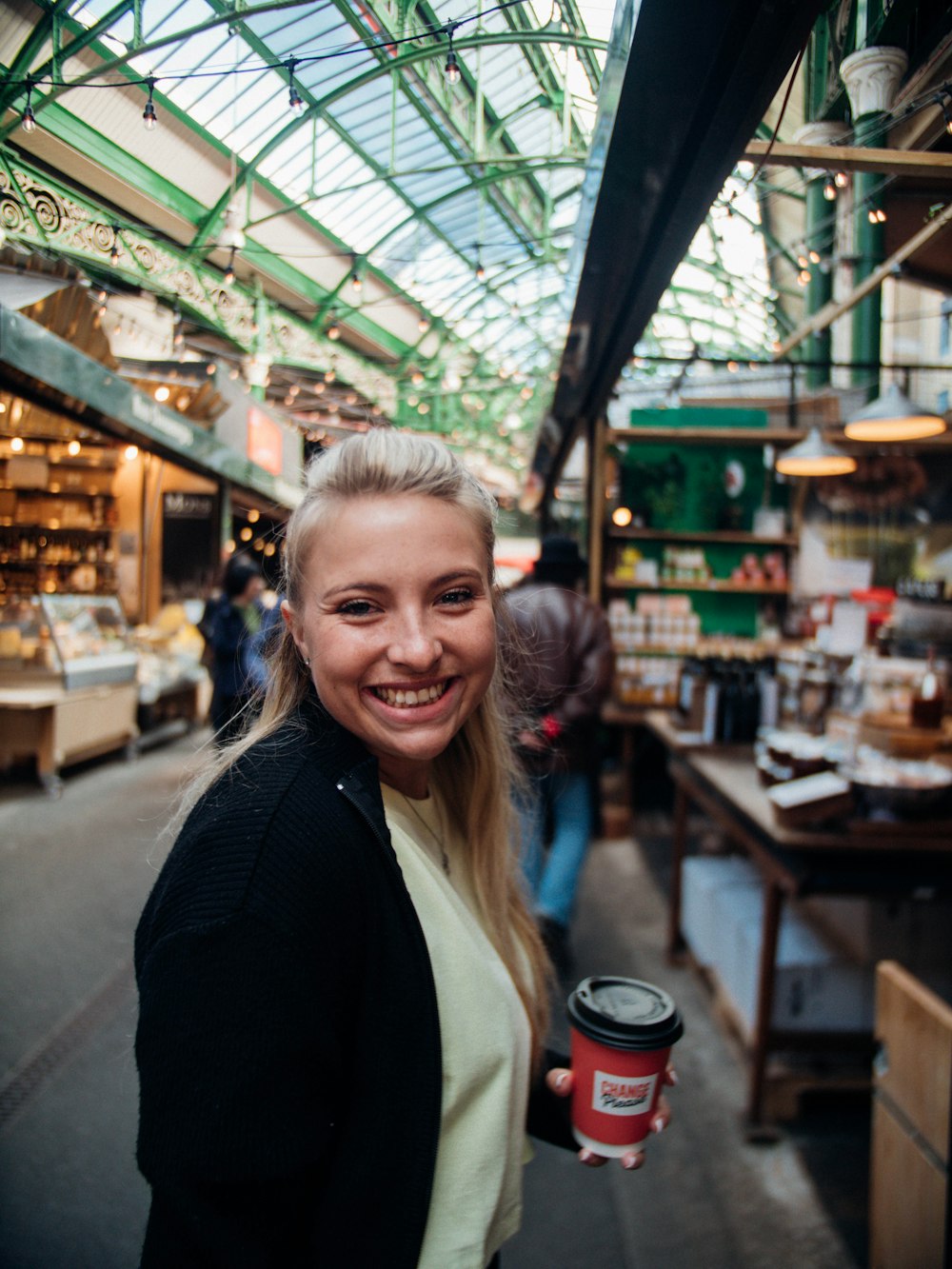 a woman smiling in a store