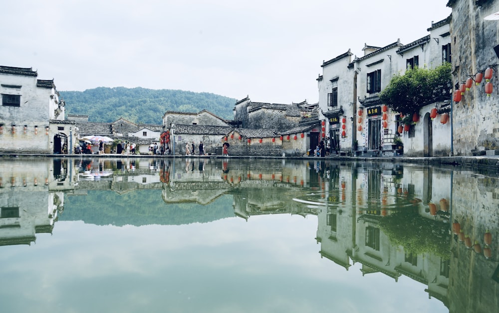 a body of water with buildings along it