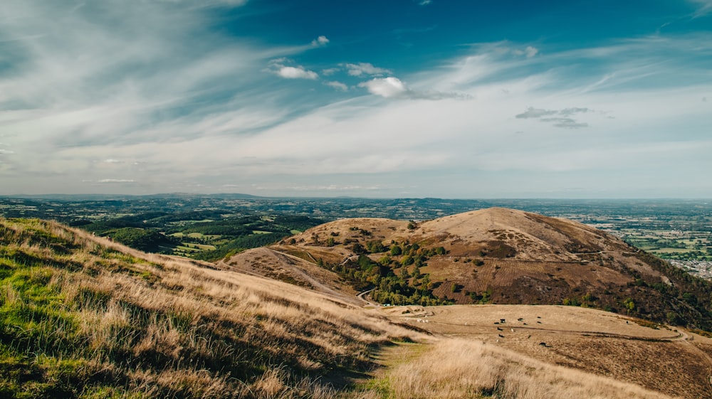 a dirt road on a hill