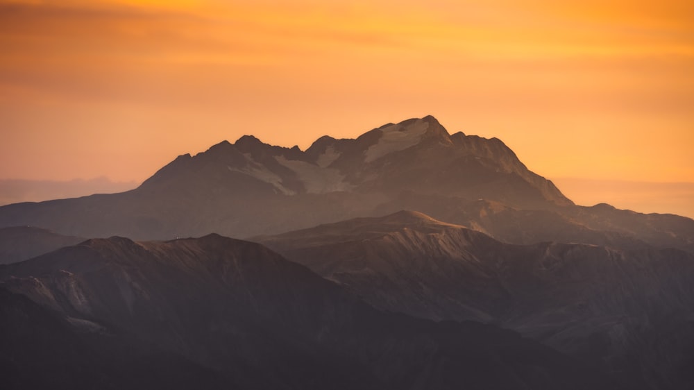 a large mountain in the background