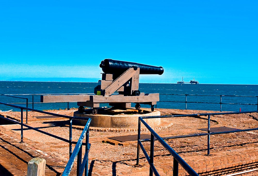 a cannon on a pier
