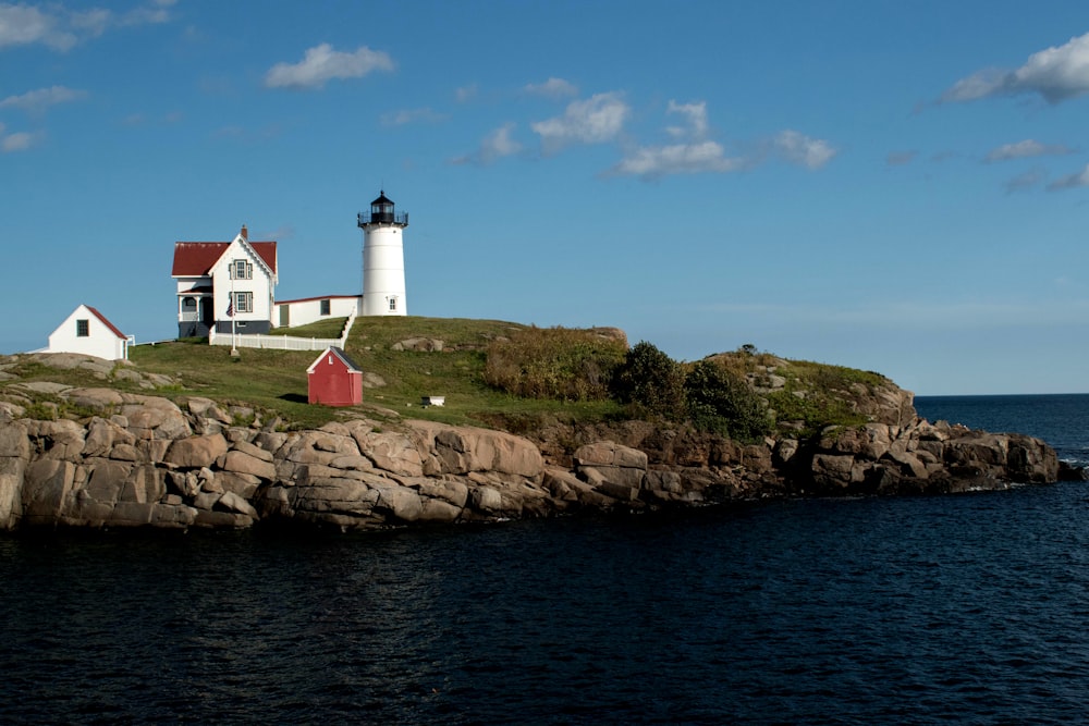 a lighthouse on a rocky island