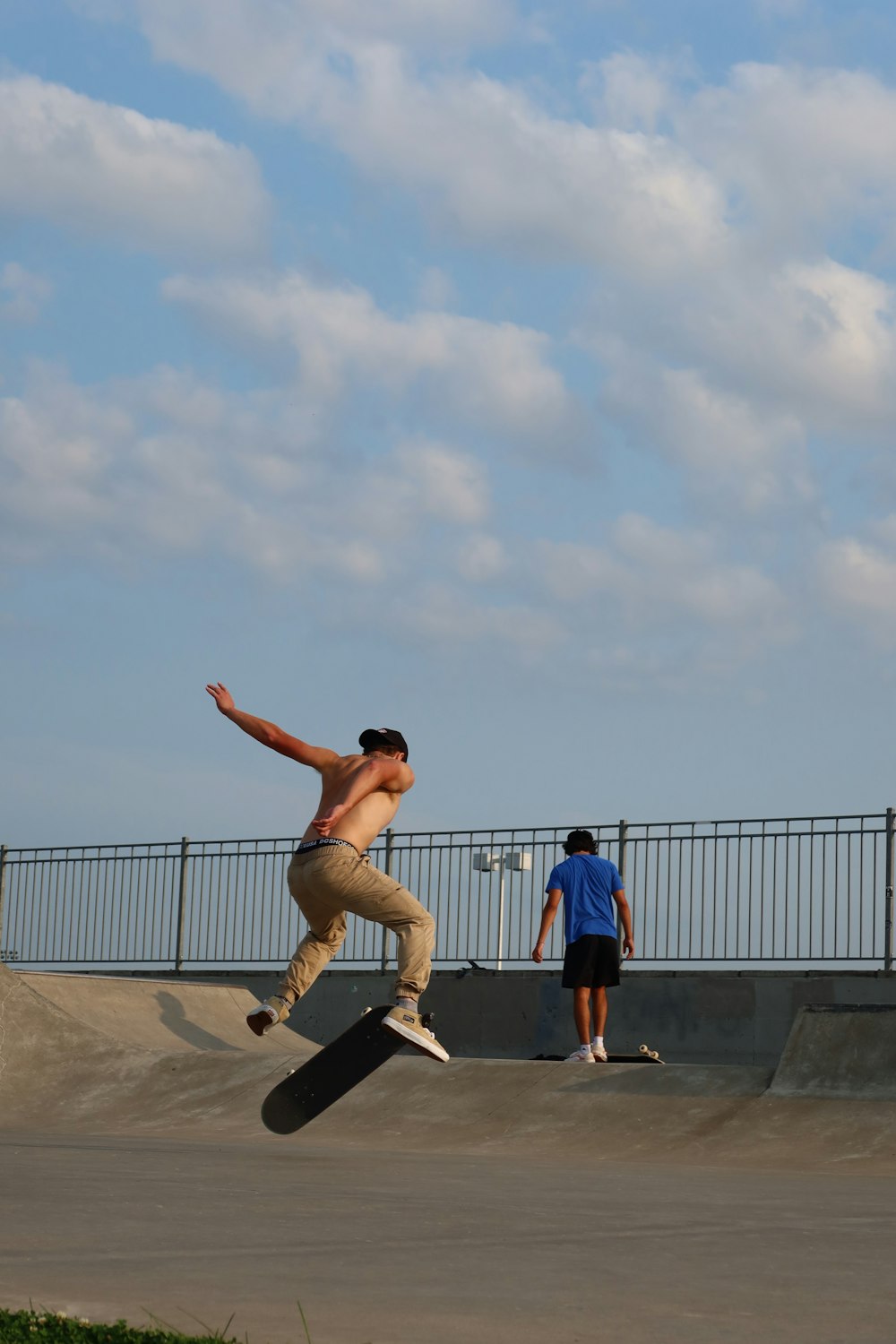 a man doing a trick on a skateboard