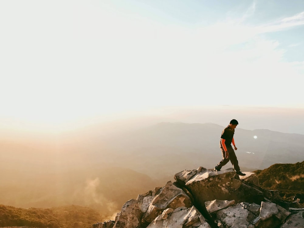 a man standing on a rock