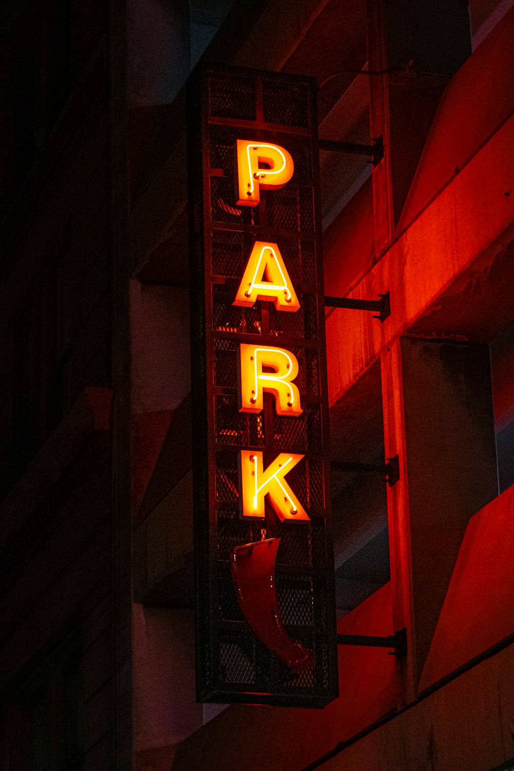 a neon sign in a dark room