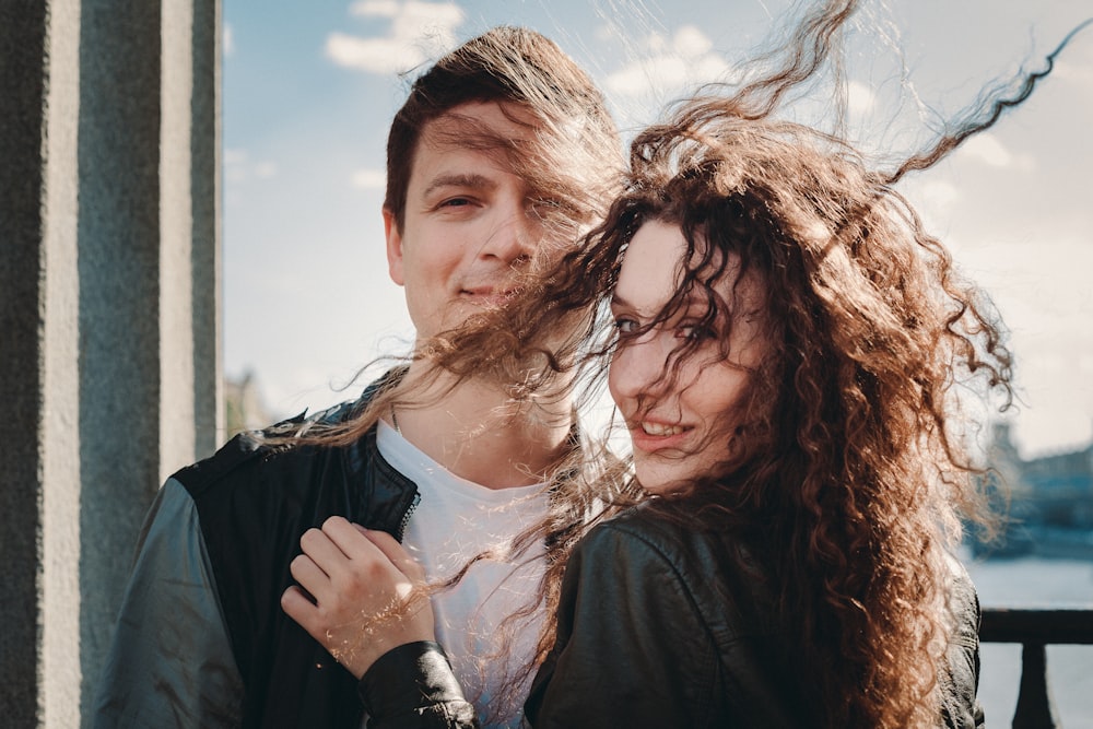 a man and woman posing for a picture