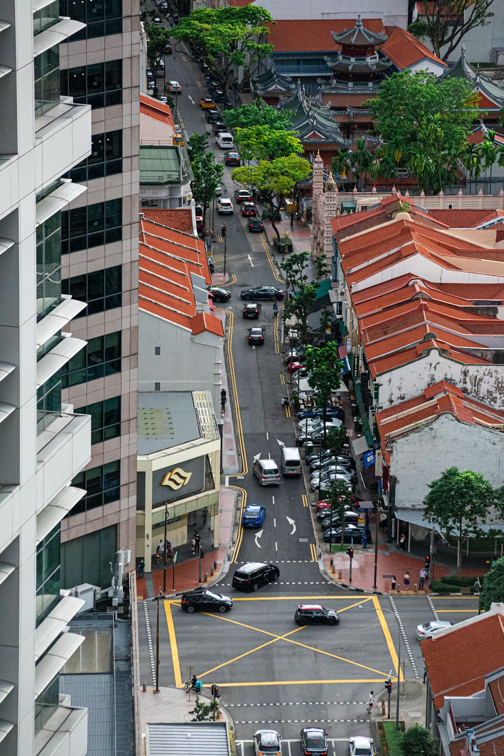 a street with cars and buildings