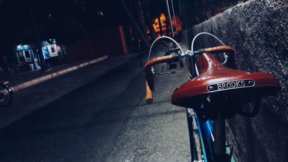 a bicycle parked on the side of a road