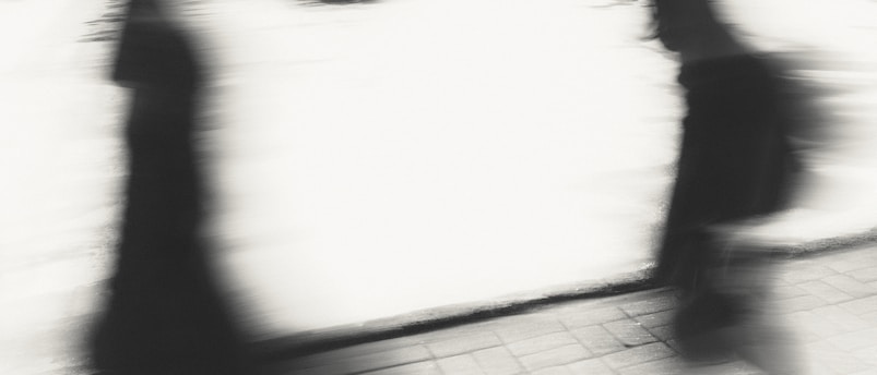 a person holding a laptop