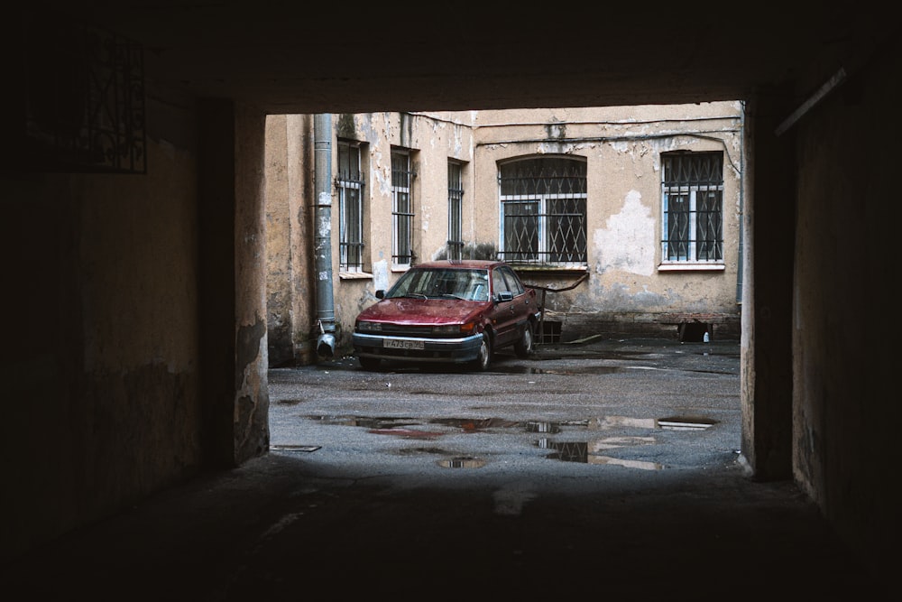 a car parked in a ruined building