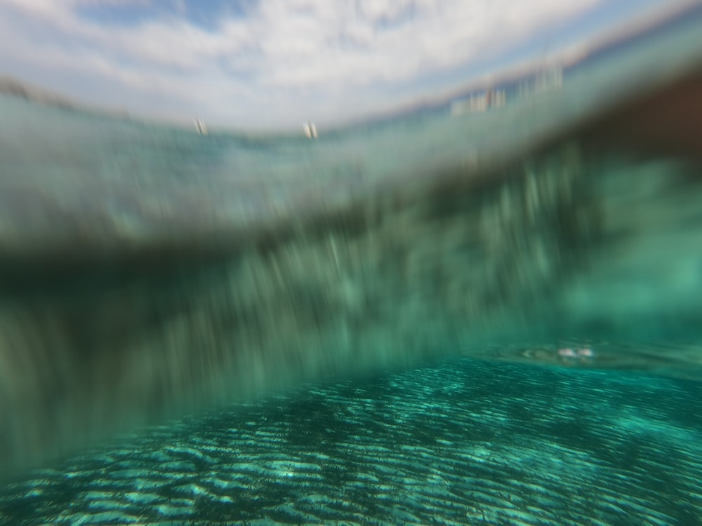 a body of water with a bridge over it