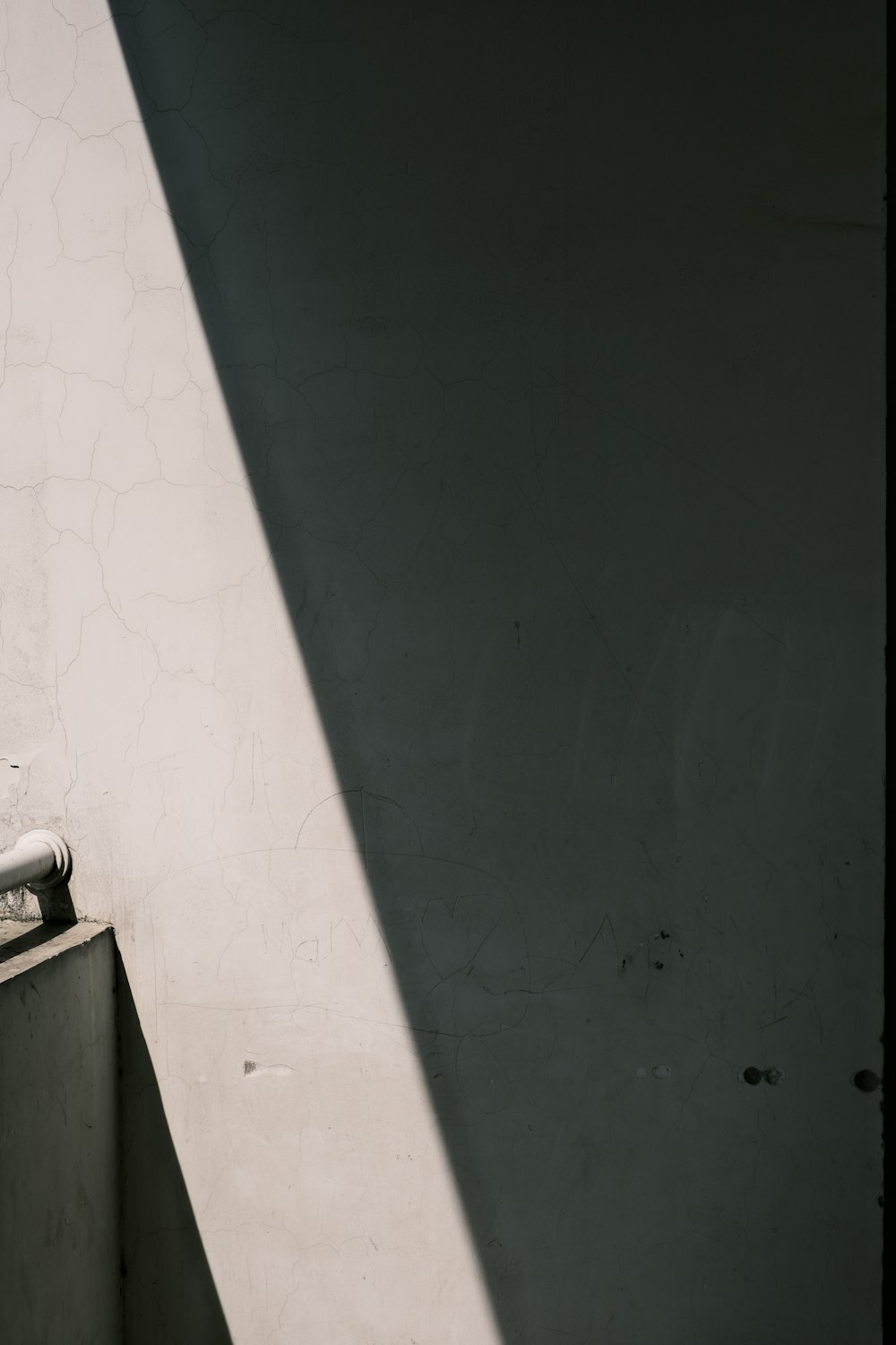 a shadow of a person on a wall