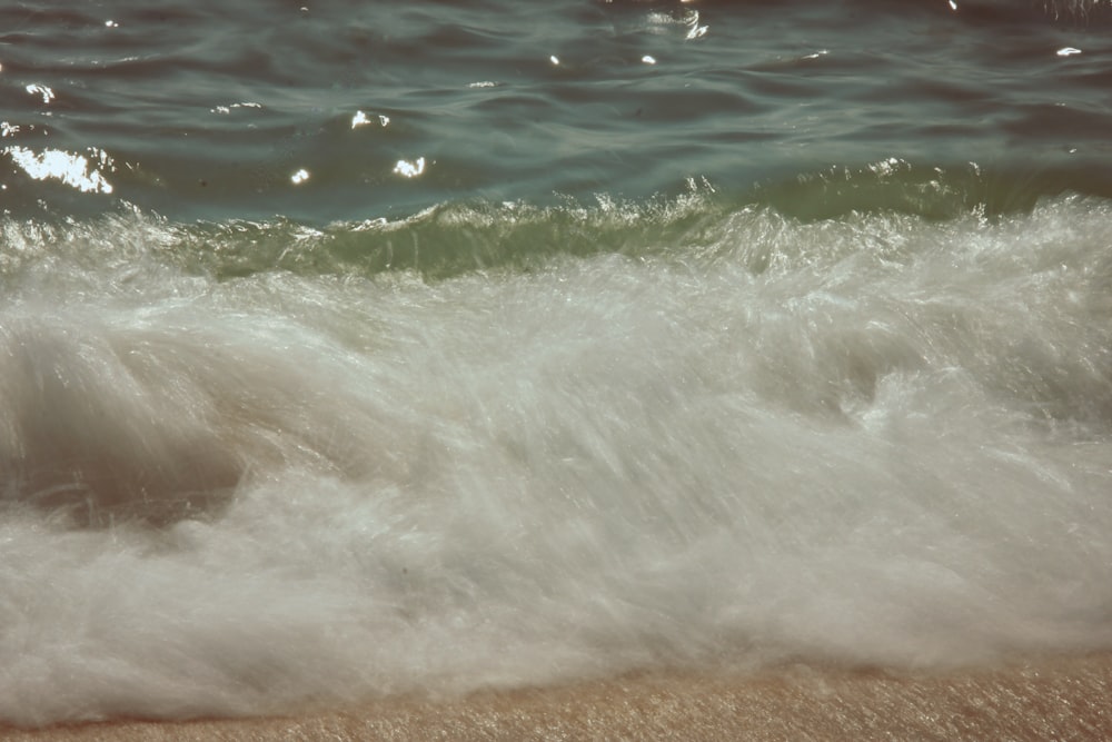 a body of water with waves