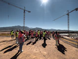 Engineers from bc epikaizo inspecting a construction site under a bright South African sky.