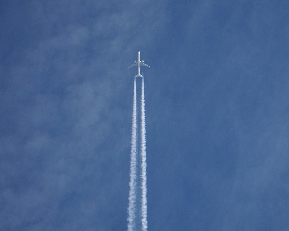 a plane flying in the sky