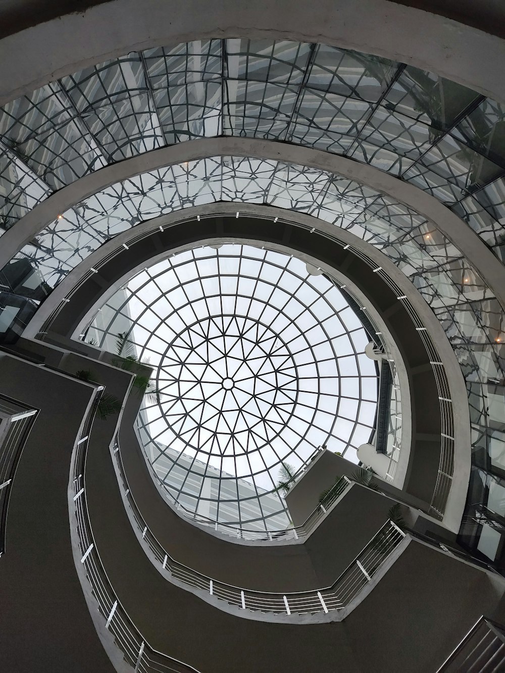 a large circular ceiling with a circular window